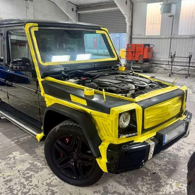 Black Mercedes prepared for bodywork in the workshop