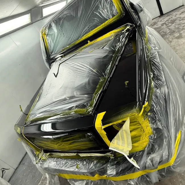 Black Mercedes in the bodywork workshop