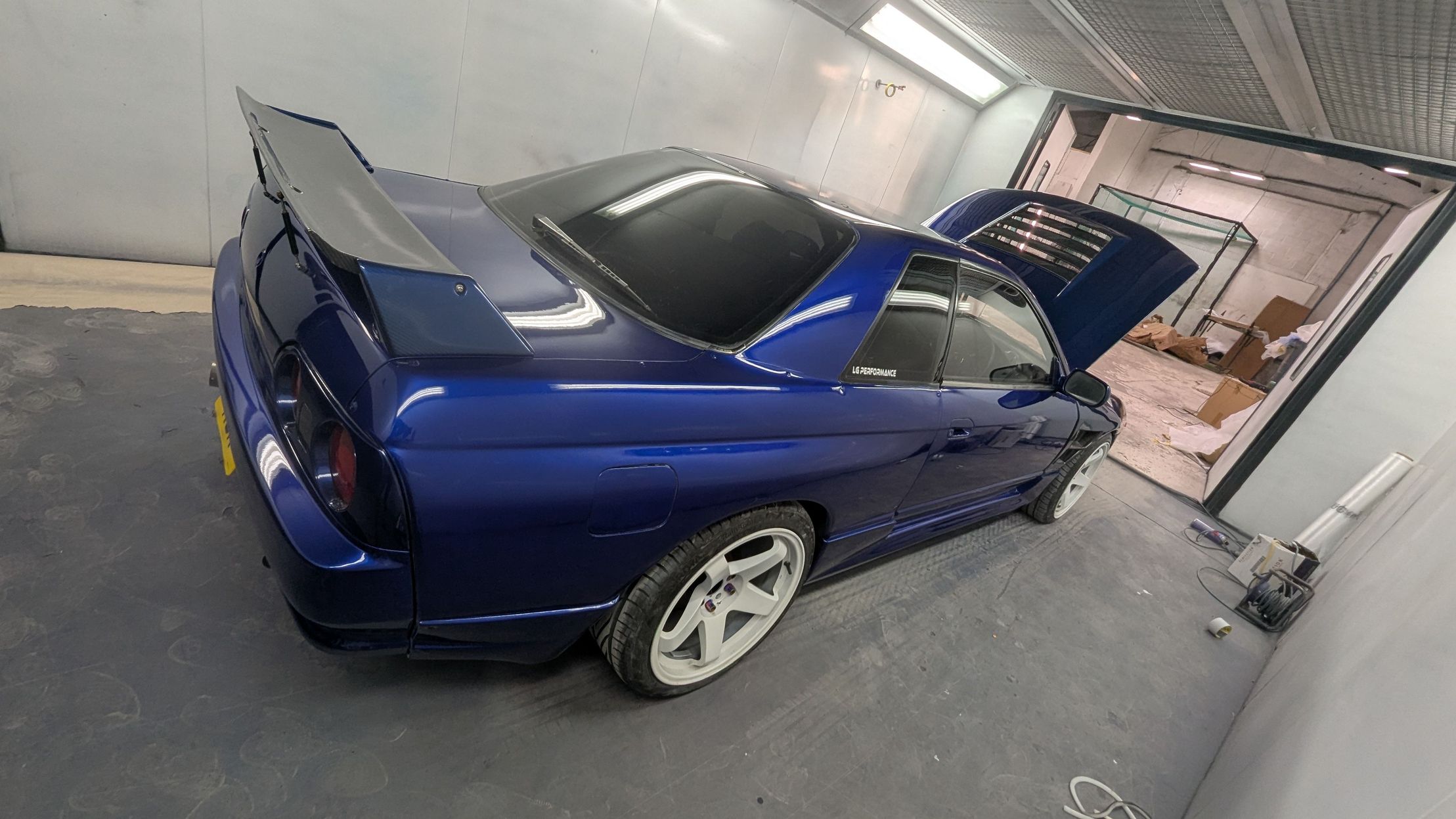 Nissan Skyline R32 in deep blue after a full respray, rear view